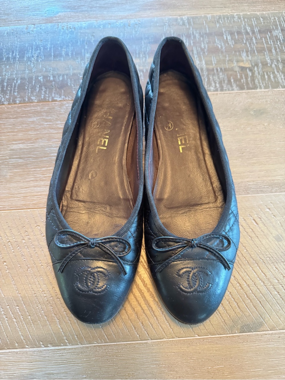 Chanel Classic CC Ballet Flats - Black Quilted Lambskin
- Size 38